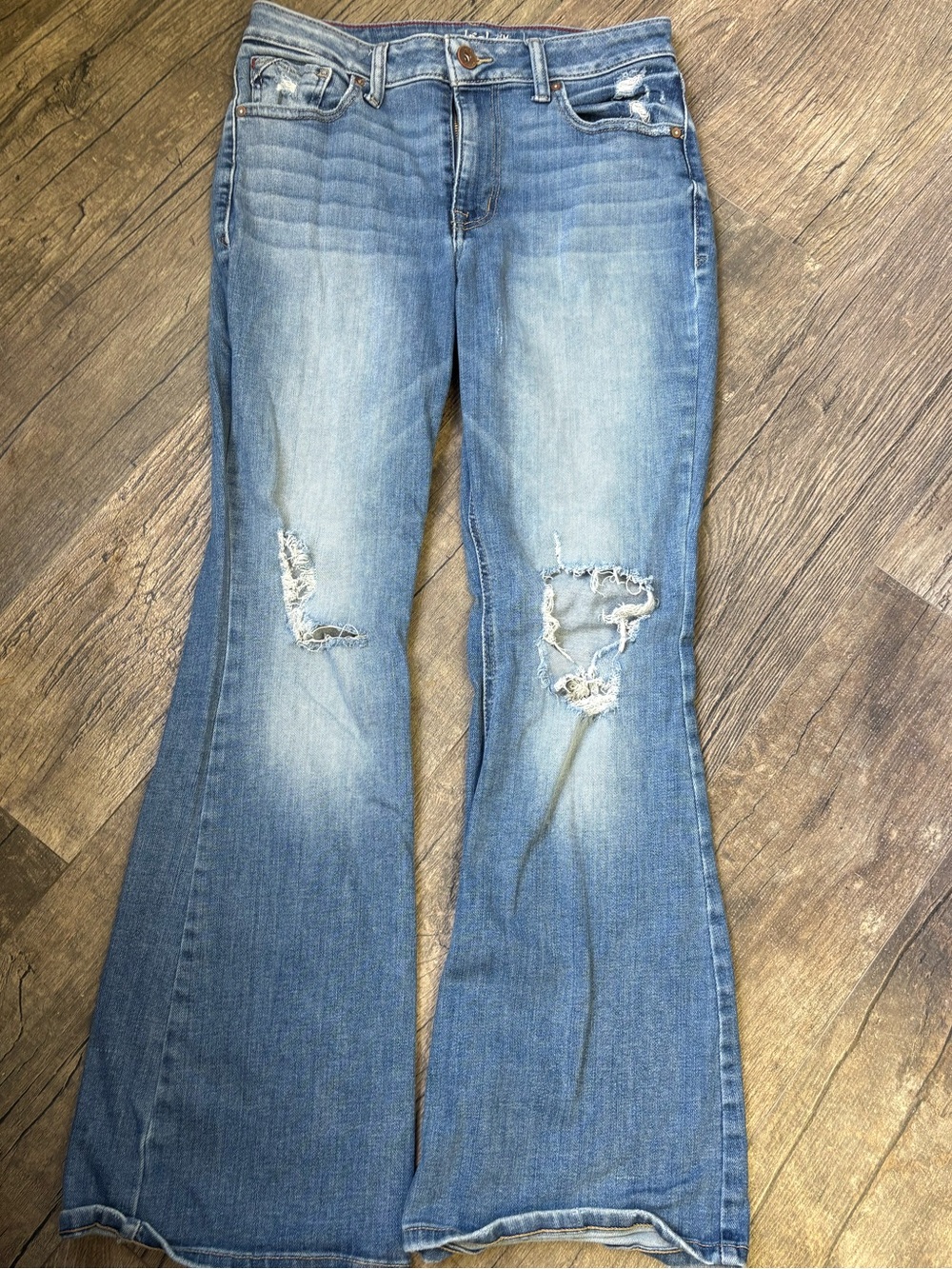 Women’s Distressed Light Blue Flare Jeans